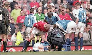 Roy Keane stands over Alf-Inge Haaland after his infamous tackle