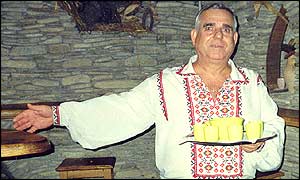 Moldovan man greets visitors to factory