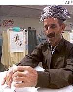 A Kurdish man votes north of Baghdad
