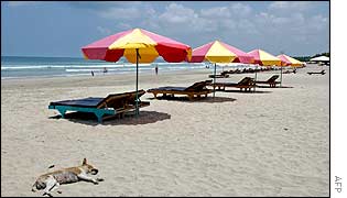Buddhist monks and others pray during a memorial services in Denpasar, Bali, 15 October 2002 