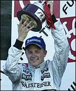 Kimi Raikkonen on the podium after the Japanese Grand Prix