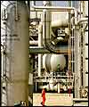 Man walks through Gulf refinery