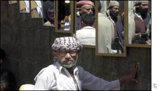 A mirror seller in the Yemeni capital, Sanaa