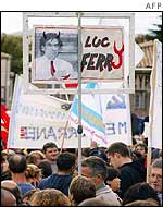 Demonstrators in Montpellier hold a portrait of French Eucation Minister Luc Ferry 