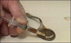 Heroin being prepared for injection
