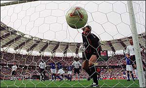 David Seaman watches Ronaldinho's free-kick sail over his head in England's World Cup quarter final defeat to Brazil