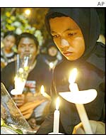 An Indonesian student mourns the dead