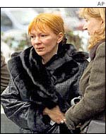 Mr Tsvetkov's wife comforted by an official