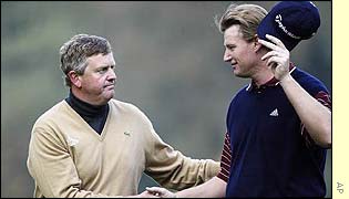 Colin Montgomerie congratulates Ernie Els