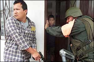 Security forces raid a house in Medellin