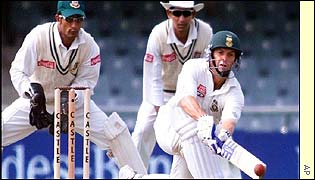 Gary Kirsten works the ball away through the onside