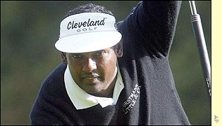 Vijay Singh lines up a putt during his 4 & 3 win over Retief Goosen