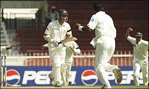 Justin Langer is dismissed by Waqar Younis for four