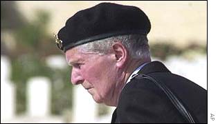 Veteran Jack Haywood, of England, looks for a friends tomb at the British cemetery in El-Alamein 