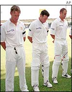 The Australian cricket team observes a minute of silence before their match against Pakistan