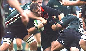Derek Lee's attack is halted by the London Irish tacklers