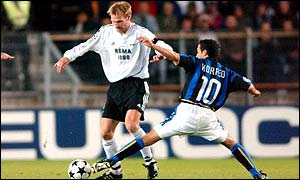 Rosenborg's Erik Hoftun (left) is tackled by Inter Milan's Domenico Morfeo in the Champions League