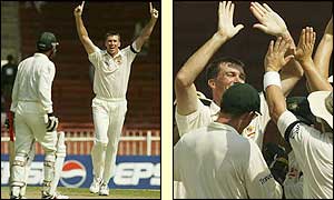 Australia fast bowler Glenn McGrath claims the wicket of Waqar Younis