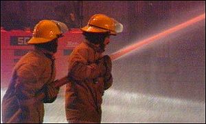 Firemen with hose