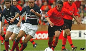 Charlie Miller (right) in action for Dundee United