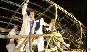 Israeli forensics examine the wreckage of the bus 