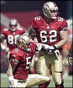 Garcia is helped to his feet by Newberry