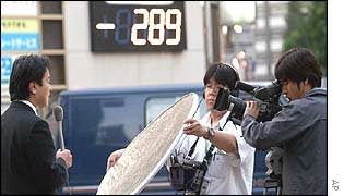 TV crew films outside Tokyo brokerage house