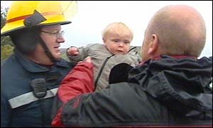 Baby being rescued