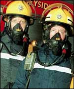 Firemen in breathing apparatus