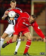 Falkirk's Lee Miller holds off Scott Wilson