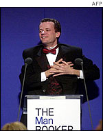 Martel accepts his prize