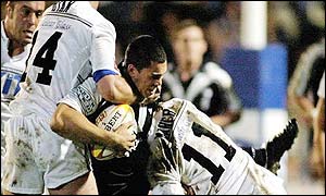 New Zealand's Lance Hohaia is tackled by Hull's Sean Ryan and Adam Maher