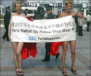 Yvonne Taylor and Kayla Worden with banner