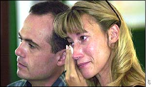 Denise Richie and Jason Hayes mourn at a Darwin memorial service