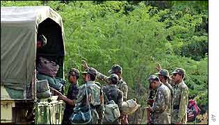 Indian troops load up their baggage in town of Bhuj