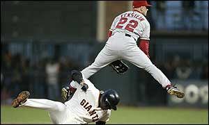 Barry Bonds slides for base in game four