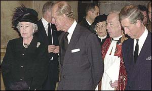 The Queen accompanied by the Duke of Edinburgh and Prince Charles, right