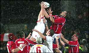 Ulster and Ireland lock Gary Longwell and Chris Wyatt of Wales jump for the ball