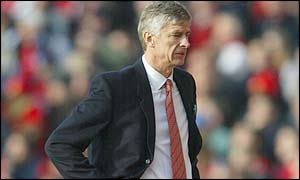 Arsene Wenger watches helpless from the touchline as Arsenal slip to another defeat