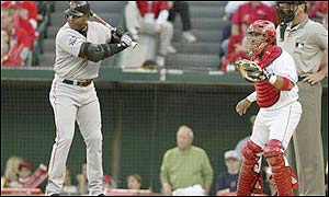 Barry Bonds' first-inning walk ties the record of 11 in a World Series held by Babe Ruth and Gene Tenace 