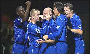 Lee Carsley (centre) is mobbed after Everton's winner