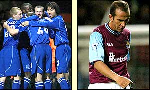 Everton celebrate Lee Carsley's 72nd minute winner while a dejected West Ham striker Paolo Di Canio walks off the pitch after the 1-0 home defeat