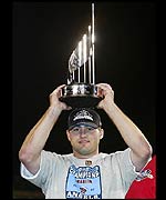Troy Glaus holds the MVP trophy aloft