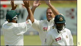 Jacques Kallis celebrates the wicket of Tapash Baisya