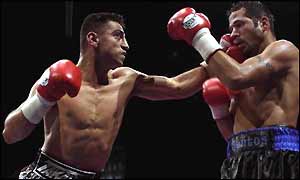 Takaloo lands a left to the jaw of Daniel Santos