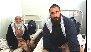 Former Afghan detainees Haji Faiz Mohammed, left, and Jan Mohammed 