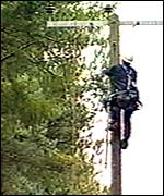 An engineer carries out repairs