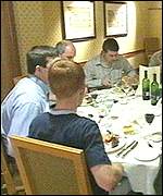 BP employees enjoy a meal before the singing begins