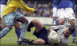 Andy Marshall makes a save during a game against Sheffield Wednesday
