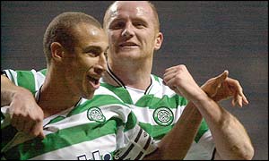 Celtic goalscorer Henrik Larsson celebrates with team-mate John Hartson